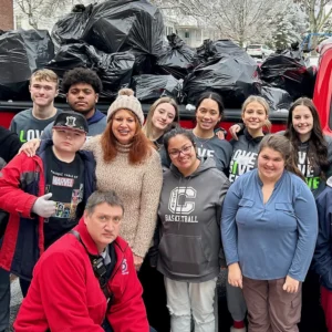 Volunteers pose after picking up