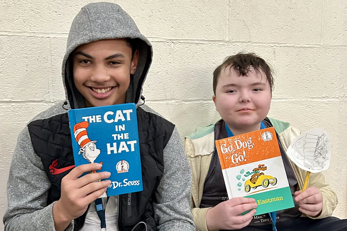 Cushing Center Students Holding Dr. Seuss Books