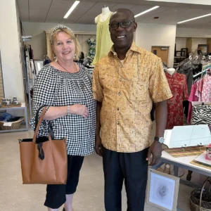 Two customers posing at Take 2 Thrift Shop