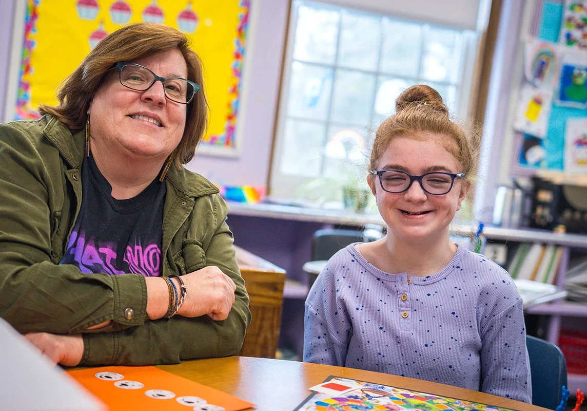 Cushing student with teacher